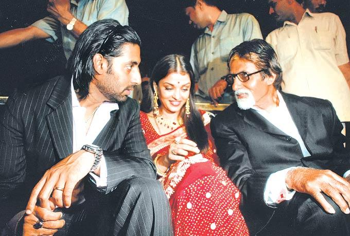 Aishwarya Rai Bachchan and Abhishek Bachchan with Amitabh Bachchan at an event
