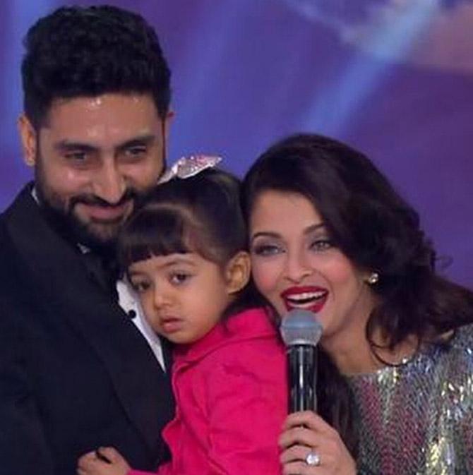 Aishwarya Rai Bachchan and Abhishek Bachchan with daughter Aaradhya at an award function back when Aaradhya was a tiny tot.