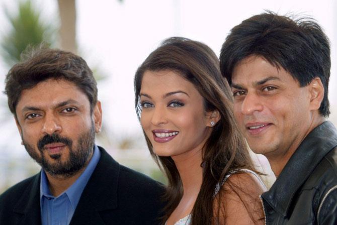 Sanjay Leela Bhansali, Aishwarya Rai and Shah Rukh Khan pose for photographers during the photocall for their film 'Devdas' during the 55th Cannes Film Festival on May 23, 2002.