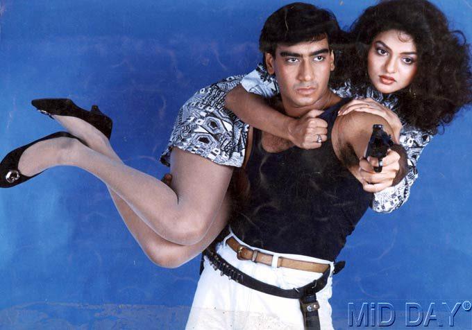 Phool Aur Kaante: Ajay's bike stunt introduction in his debut film remains fresh as ever. The movie, in which Ajay played the son of a dreaded don, set the tone for action hero image.