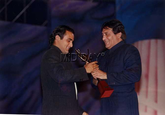 Pictured: Akshaye Khanna with father Vinod Khanna at an awards ceremony