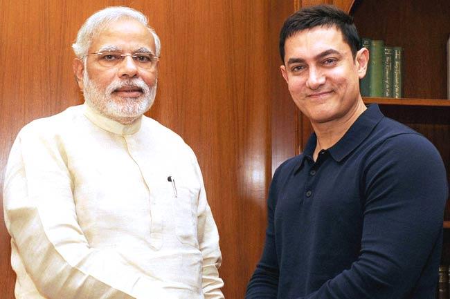 Actor-producer Aamir Khan met PM Narendra Modi in June 2014, and discussed social issues raised by the former's TV show 'Satyamev Jayate'. 'Shared with him the overwhelming support that we got from people across the country through Vote for Change Campaign... on SMJ ('Satyamev Jayate') on the various issues that we tackled in our show. He has assured me that he will look into all the matters,' Aamir tweeted after the meeting. Pic/PTI