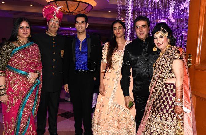 Tabu's sister-actress Farah Naaz (first from left) is married to former Bollywood actor-producer Sumeet Saigal (second from right), who is the father of Shivaay actress Sayyeshaa Saigal with his first wife. Sumeet was earlier married to Shaheen, veteran actress Saira Banu's niece. Farah Naaz was earlier married to actor Vindu Dara Singh, with whom she has a son Fateh Randhawa.