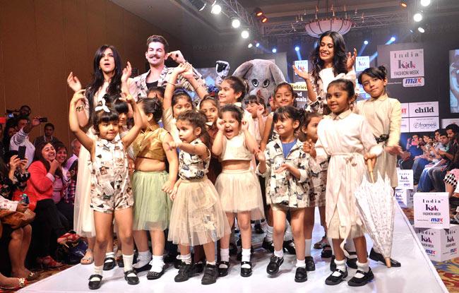 Neil Nitin Mukesh and Sarah Jane Dias pose with some children on the ramp