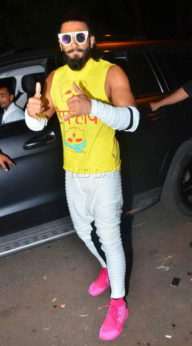 We love the fact that Ranveer Singh can pull off pink sneakers so well! Who said Pink was only for ladies