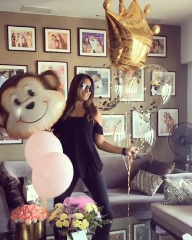 Bipasha Basu: This is Bipasha Basu and Karan Singh Grover's living room. The walls are full of pictures of the couple - before and after their wedding. Isn't that romantic?