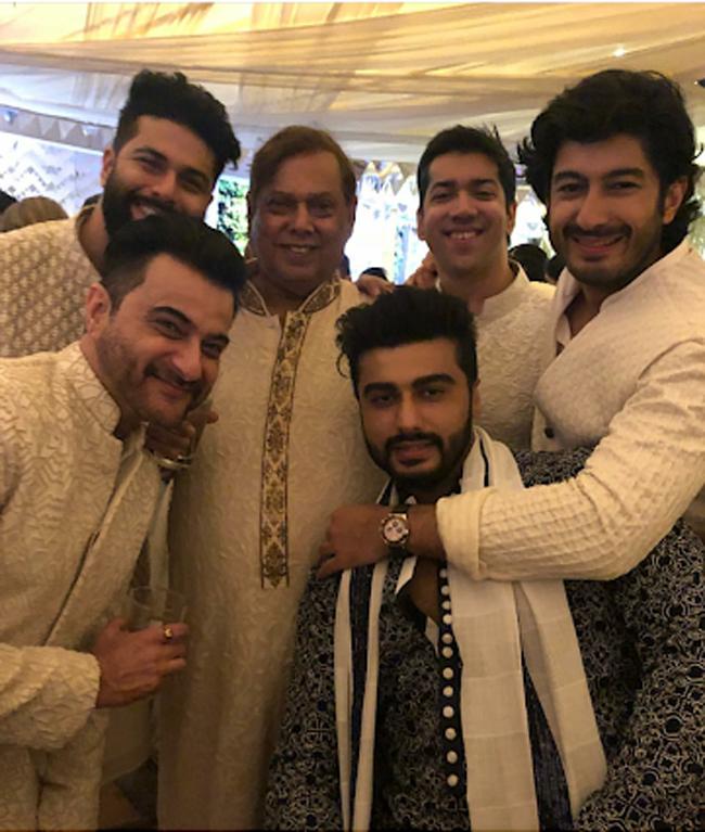 (L-R) Sanjay Kapoor, Kunal Rawal, David Dhawan, Rohit Dhawan, Mohit Marwah and Arjun Kapoor posed for a picture during the sangeet ceremony of Sonam Kapoor and Anand Ahuja.