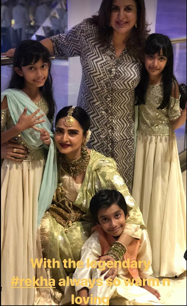 Veteran actress Rekha, Farah Khan and her kids pose for a picture during the sangeet ceremony of Sonam Kapoor and Anand Ahuja.