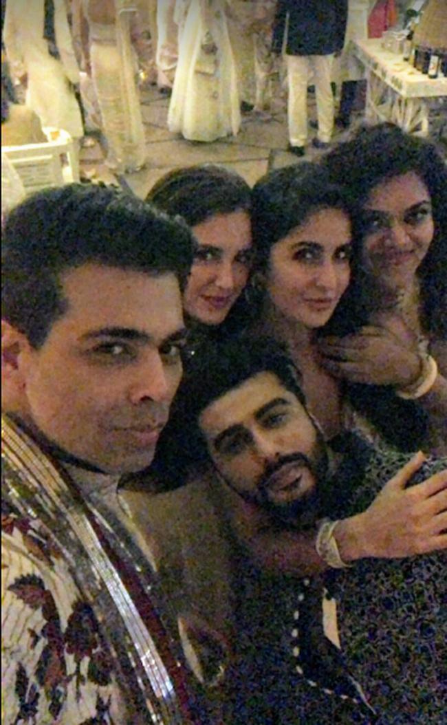 Karan Johar takes a selfie with Isabelle Kaif, Katrina Kaif, Arjun Kapoor and a friend during the sangeet ceremony of Sonam Kapoor and Anand Ahuja.