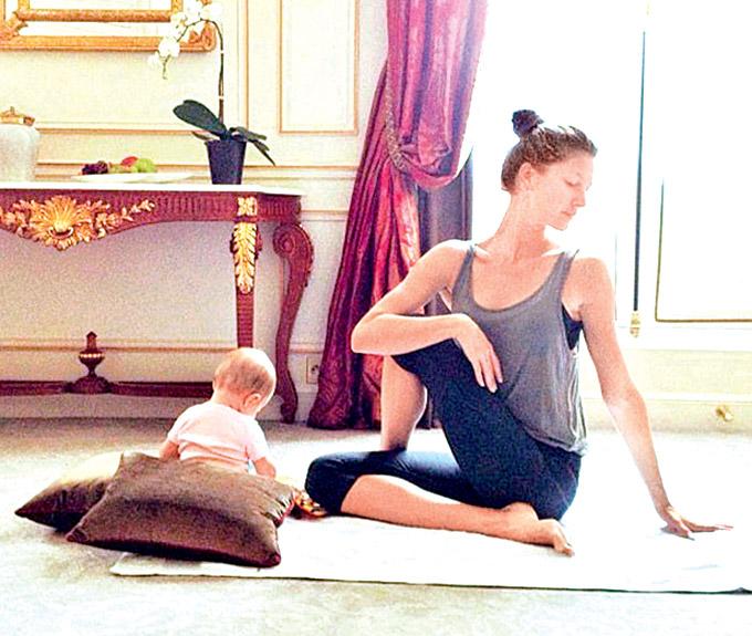 Brazilian supermodel Gisele Bundchen spends her mornings practising yoga for an hour with daughter Vivian by her side. She posted this picture online along with a message, 'Practising yoga with my little partner before going to work.'
