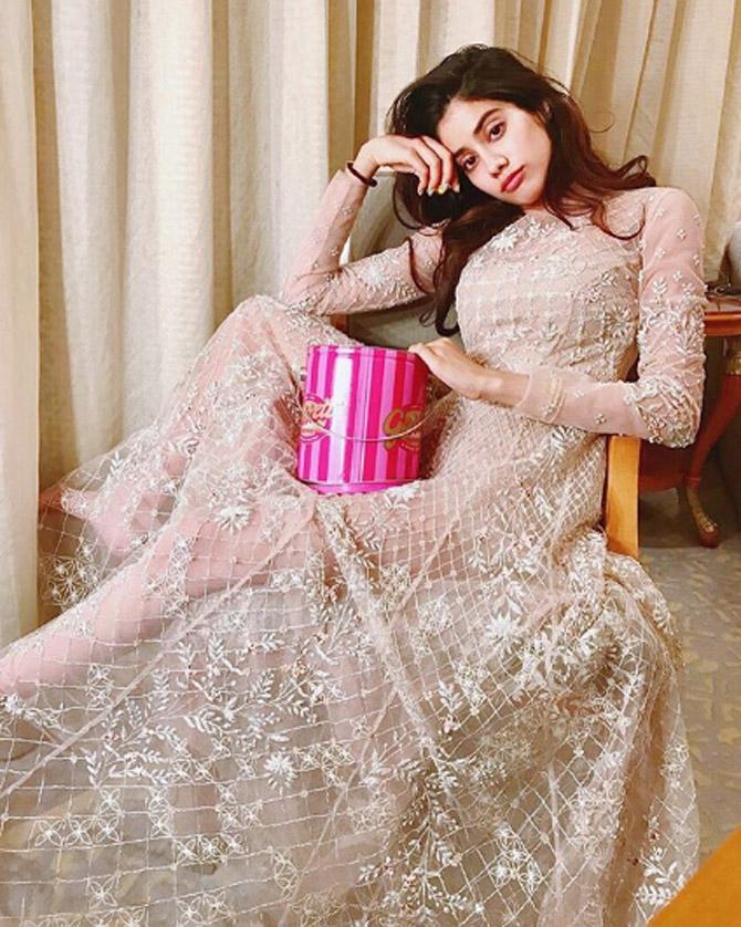 While the newbie was a bundle of nerves on the first day on set, she said the makers ensured she was comfortable. 'The first day was fun. Shashank (Khaitan) had established a safe haven for us and we were already feeling like a family. But I was nervous. I didn't sleep the night before we started rolling. We kicked off with Yad Lagla [the song adapted from the original film Sairat],' she said. Pictured: We absolutely love Janhvi Kapoor's outfit! She captioned this picture, 'Wedding season got me like...'