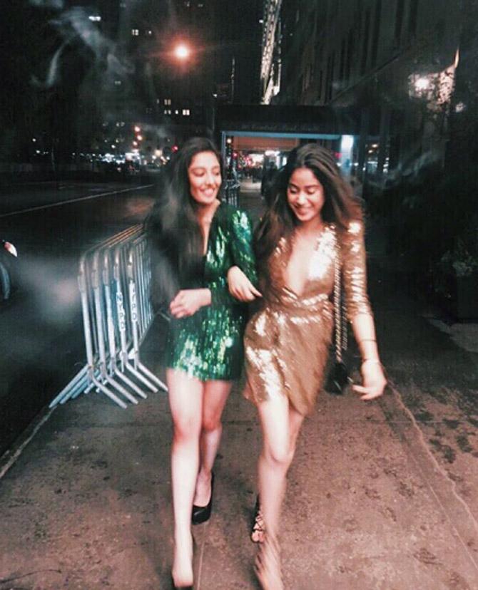 Janhvi Kapoor and her friend opt for shimmery outfits and look their fashionable best.