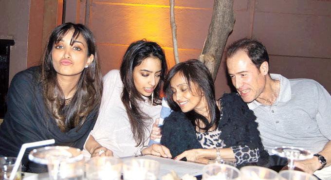 Jiah Khan with family and friends at a birthday celebration.