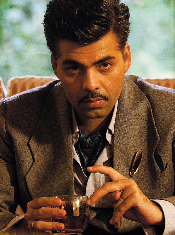 In 2015, Karan Johar bagged his first full-fledged role in Bollywood as Kaizad Khambatta, the flamboyant, quick-witted, Parsi media mogul, in 'Bombay Velvet', alongside Ranbir Kapoor and Anushka Sharma. As Khambatta in the Anurag Kashyap directorial, Karan wore a debonair look and sported a fake moustache that added to the panache of his get up. He found the fake moustache 'annoying' but said it was an emotional experience as it reminded his mother of his late father Yash Johar.