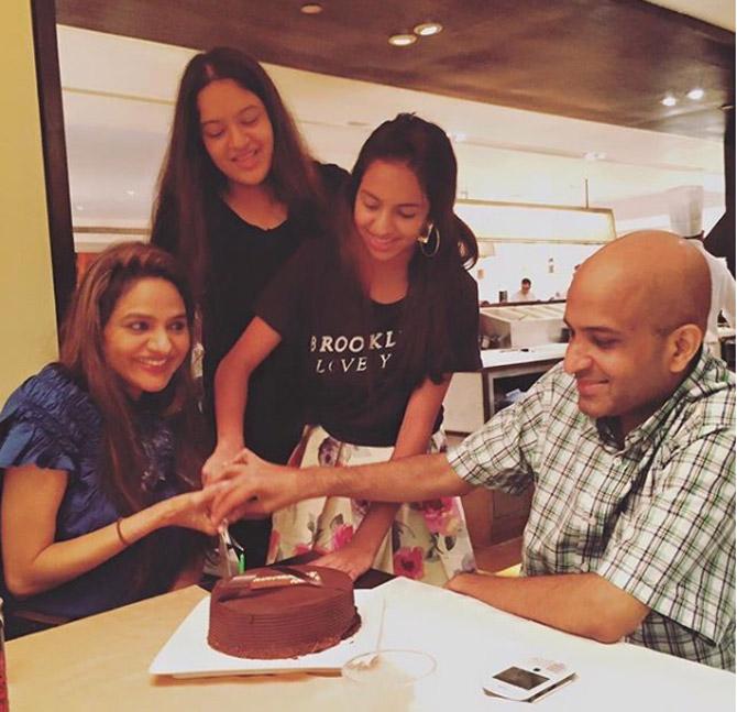 Here's taking a look at some more candid pictures of Madhoo with her friends and family!
Madhoo with her husband Anand Shah and daughters Ameyaa and Keia.
