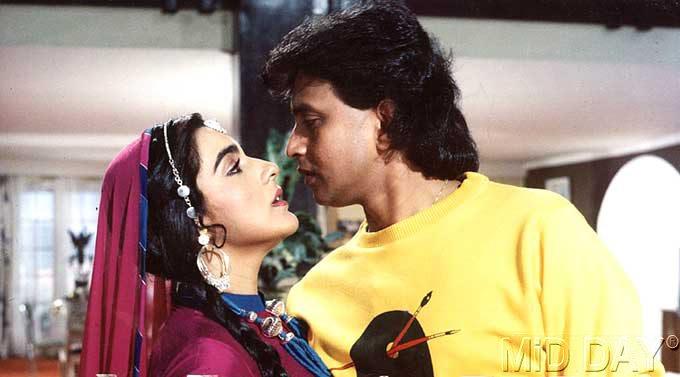 In the 80s, Mithun had a much-publicised extra-marital affair with late actress Sridevi, and a tabloid even claimed that they had married secretly. However, they are still termed to be 'rumours'. In picture: Mithun Chakraborty with Amrita Singh - A still from 'Agnee'