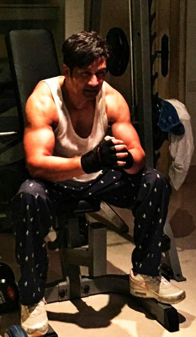 Shekhar Suman has been bulking up and sharing photos of his bulging biceps on his Twitter account (Photos courtesy: Shekhar Suman's Twitter account and Adhyayan Suman's Instagram account)