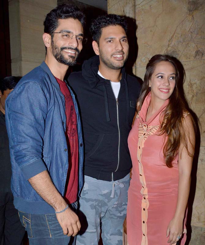 Angad Bedi, Yuvraj Singh and Hazel Keech are all smiles for the cameras Angad Bedi, Yuvraj Singh and Hazel Keech are all smiles for the cameras