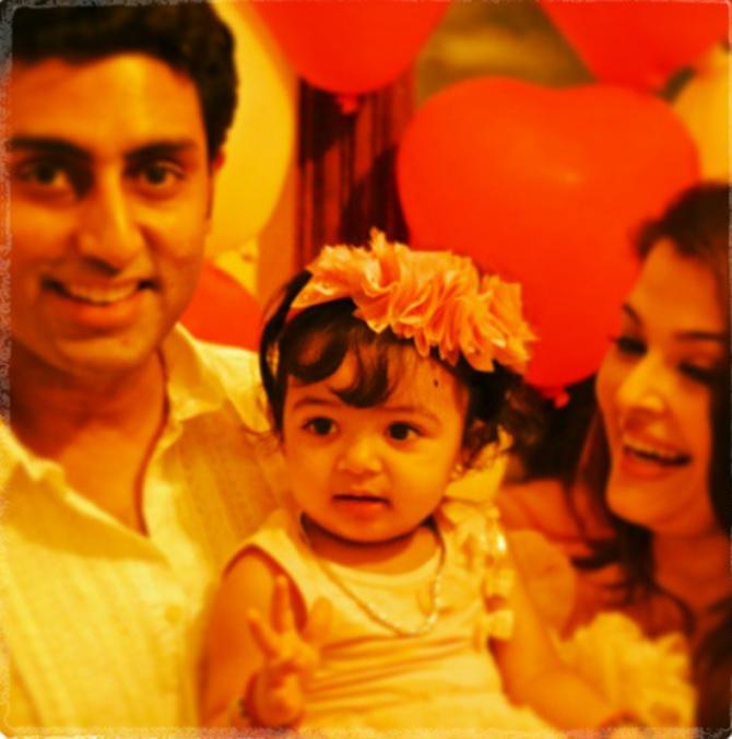Amitabh Bachchan's son Abhishek Bachchan with wife Aishwarya Rai Bachchan and granddaughter Aaradhya Bachchan, when she turned 1.