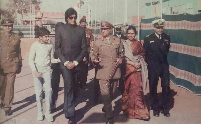 Abhishek Bachchan accompanies father Amitabh Bachchan to an event in this vintage picture.