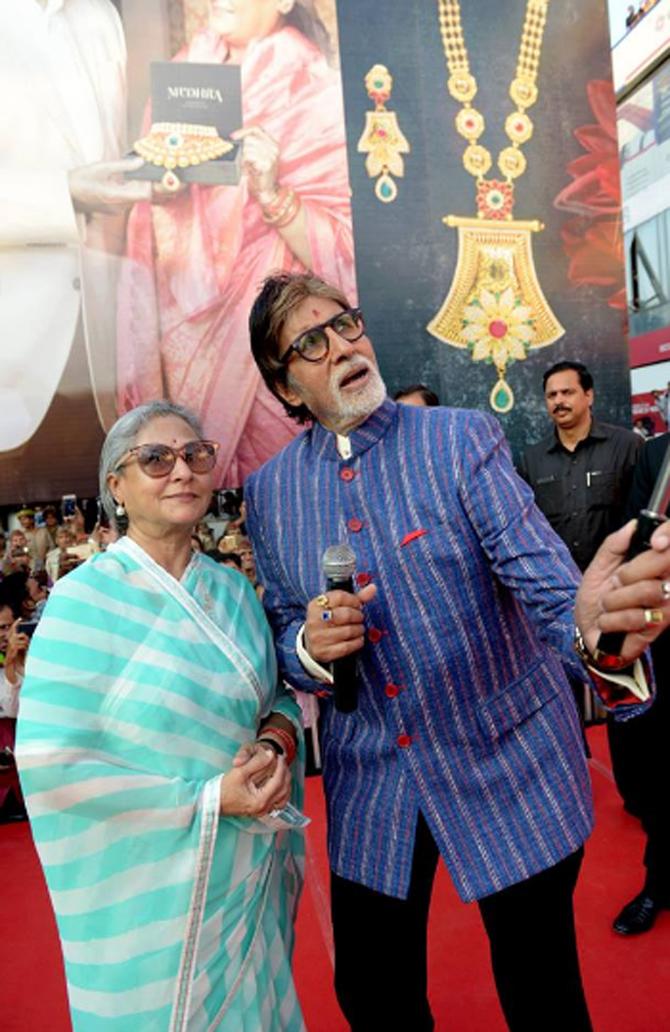 Amitabh Bachchan strikes a filmy pose with his better half, Jaya Bachchan.