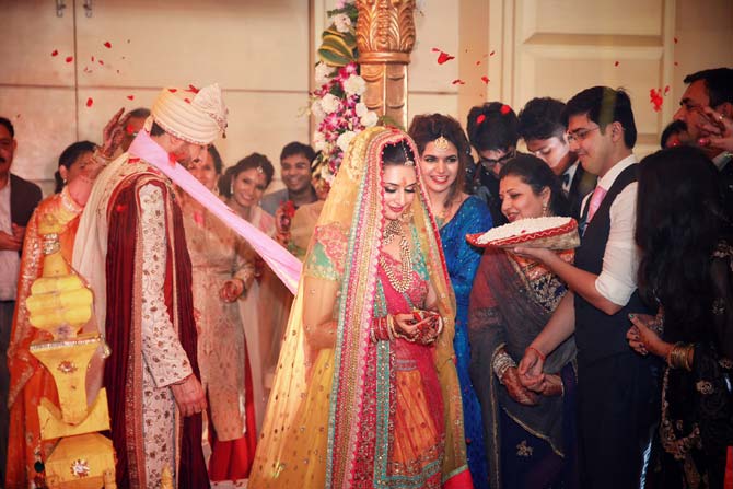 The couple had an elaborate four-day marriage ceremony. The Baraat reached Bhopal on July 7 for the sangeet and the wedding was on July 8. The couple and their family then left for a reception in Chandigarh on July 10. In picture: Divyanka Tripathi and Vivek Dahiya take the 'pheras'