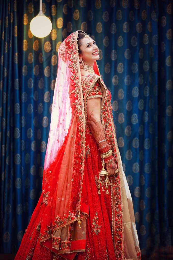 The actress recalled, 'We were introduced to each other by a common friend in August 2015 for marriage prospects. After this, it was awkward for us to shoot together. But I don't think our co-actors ever got a hint. There was no courtship as we were looking at the relationship culminating into marriage.' In picture: Divyanka Tripathi strikes a pose in her bridal dress