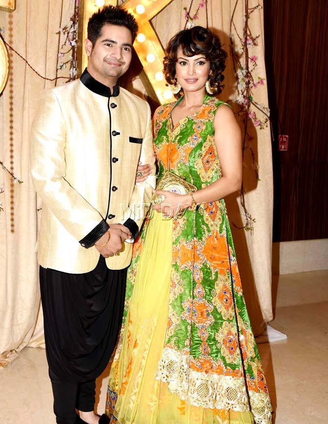 Karan Mehra with wife Nisha Rawal at Kishwer Merchantt and Suyyash Rai's wedding reception
