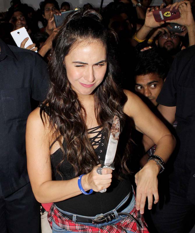 Lauren strikes a quirky pose for shutterbugs