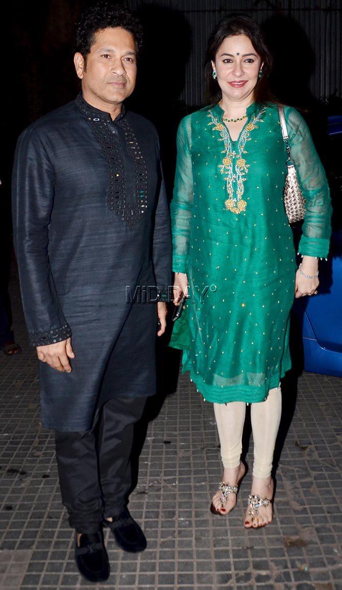 Sachin Tendulkar, who looked great in a black kurta, poses with his wife Anjali at Zaheer Khan and Sagarika Ghatge`s mehendi ceremony Sachin Tendulkar, who looked great in a black kurta, poses with his wife Anjali at Zaheer Khan and Sagarika Ghatge`s mehendi ceremony