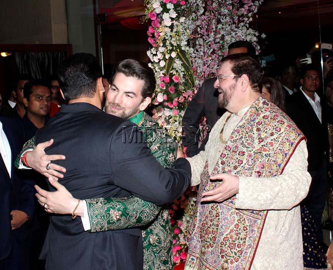 Salman Khan and Neil Nitin Mukesh exchange greetings as Nitin Mukesh looks on