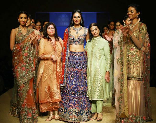 Ujjwala Raut walked for Asheema and Leena in a plunging neckline blouse and lehenga with odhni