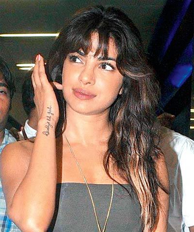 Priyanka Chopra was very close to her father Ashok Chopra, who died in June 2013. She got a tattoo reading 'Daddy's lil girl' inked on her wrist in his handwriting.