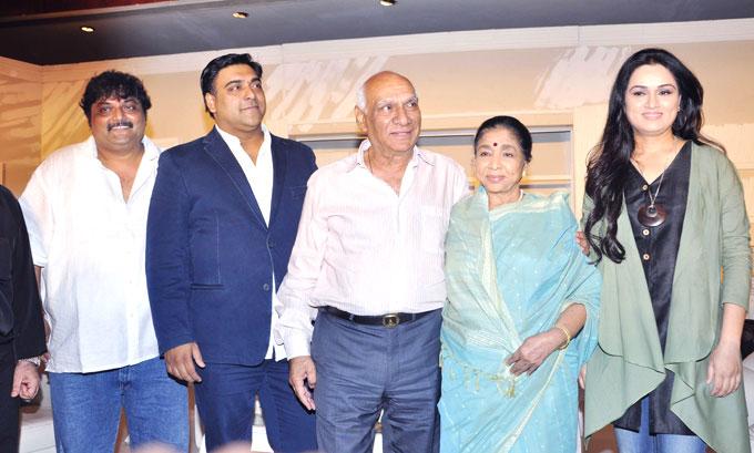 As a person, Ram Kapoor is very sensitive. And Ram reasons it, saying, 'If you have to be an artiste, you have to be a sensitive person. You cannot be a romantic or a sensitive person and be a good actor.' In picture: Ram Kapoor with Yash Chopra, Asha Bhosle and Padmini Kolhapure at the mahurat of 'Mai'.