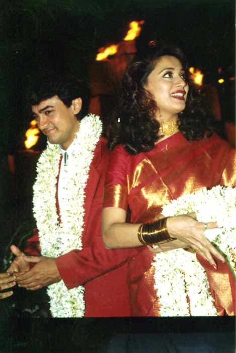 Madhuri Dixit with 90s co-star Aamir Khan with whom she did Dil and Deewana Mujh Sa Nahin. Madhuri won the Filmfare Best Actress Award for her performance in the former. Furthermore, Dil's soundtrack was also a hit with the tracks Mujhe Neend Na Aaye and Hum Ne Ghar Chora Hai becoming quite popular with listeners.