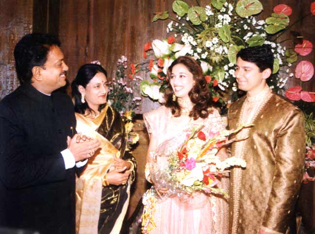 Madhuri relocated to Denver, Colorado in the United States after tying the knot in 1999 with Dr Shriram Nene, who is a cardiovascular surgeon from Los Angeles, California. In picture: Madhuri Dixit and husband Shriram Nene with former Maharashtra CM Vilasrao Deshmukh and his wife Vaishali during the actor's wedding reception in 1999.