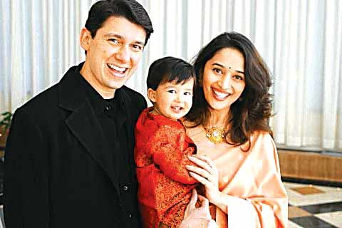 Here's a look some candid pictures of Madhuri Dixit from her younger days!
A file picture of Madhuri Dixit with her husband Shriram Nene and their son. Interestingly, prior to their wedding, Shriram was unaware of his to-be wife's celebrity status.