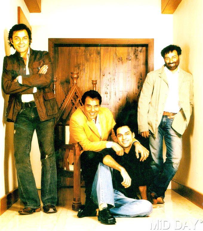 So why did the young Dharam have stardust in his eyes? Candidly, he said, 'I was in awe of the stars like Dilip (Kumar) saab, Raj (Kapoor) saab and even heroines like Nargis, Madhubala and Vyjayanthimala. But my ambitions were quite restricted! My big dream and my simple prayer to God was my pictures being present everywhere, just like those of my idols.' In picture: Dharmendra with sons Sunny Deol (R), Bobby Deol and nephew Abhay Deol