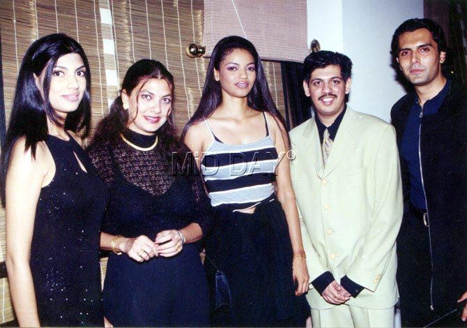 Kimi Katkar (second from left) with Aseem Merchant (extreme right) and other guests at an event.