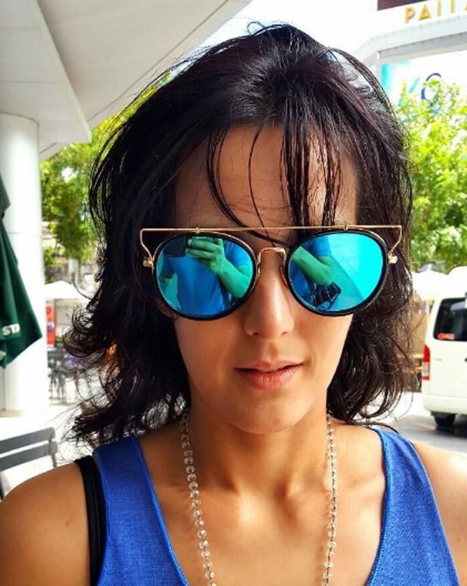 Tulip Joshi clicks a selfie in her cool blue reflector glasses.