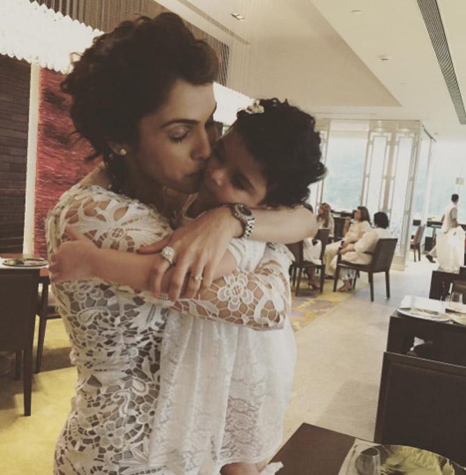 Isha Koppikar hugs and kisses her daughter Rianna in this adorable picture!
