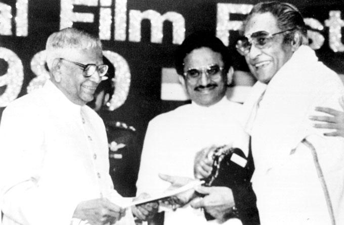 Dadamoni accepting one of his many honours Dadamoni accepting one of his many honours