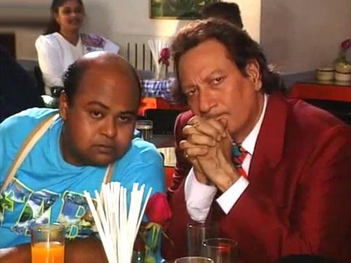 Tehkikaat: Vijay Anand and Saurabh Shukla in Tehkikaat, one of the most underrated detective-thriller series on Indian television. In terms of content, Tehkikaat was next only to Byomkesh Bakshi.