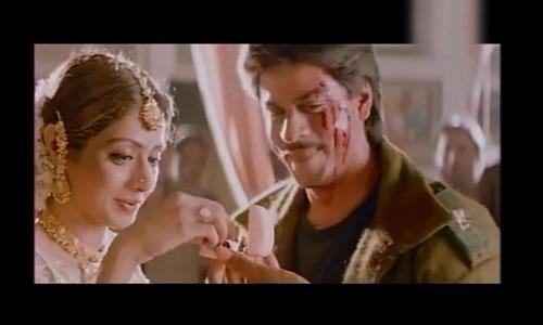 Army: SRK portrays Sridevi's husband in this 1996 movie. He is a dutiful police officer, who gets killed by a notorious gangster after which Sridevi takes it upon herself to avenge her husband's death.