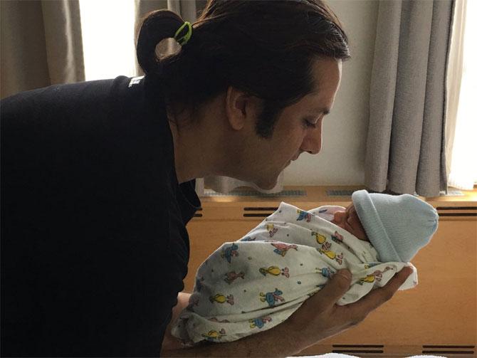 Fardeen Khan named his daughter Diani, while his son's name is Azarius. Pictured: Fardeen Khan holding his little one - Azarius.