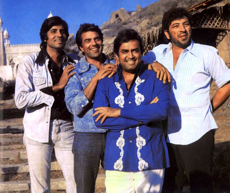 Sholay released on August 15 (Independence Day) in 1975. A picture of Amitabh Bachchan, Dharmendra, Sanjeev Kumar and Amjad Khan on the sets of Sholay.