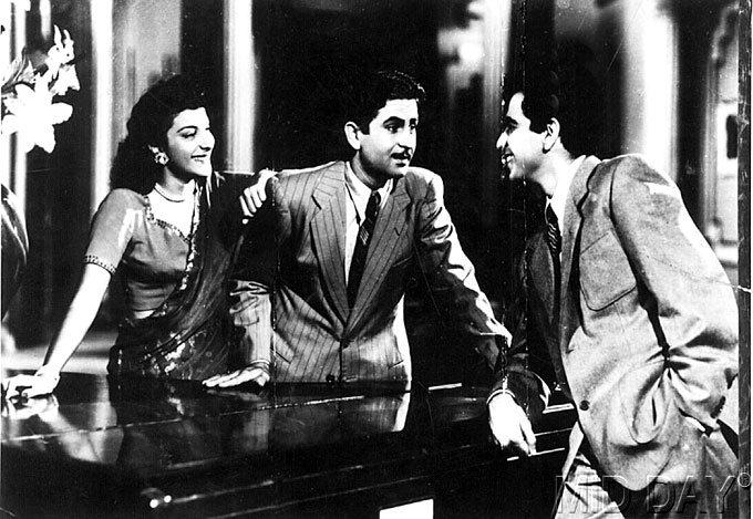 A still from the film Andaz starring Nargis, Dilip Kumar and Raj Kapoor. The 1949 film was the highest-grossing Indian film at the time of its release until its record was broken by Raj Kapoor's Barsaat that same year.