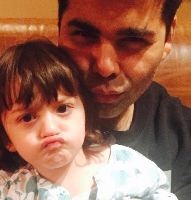 AbRam pouting with filmmaker Karan Johar! Who's pouting the right way?