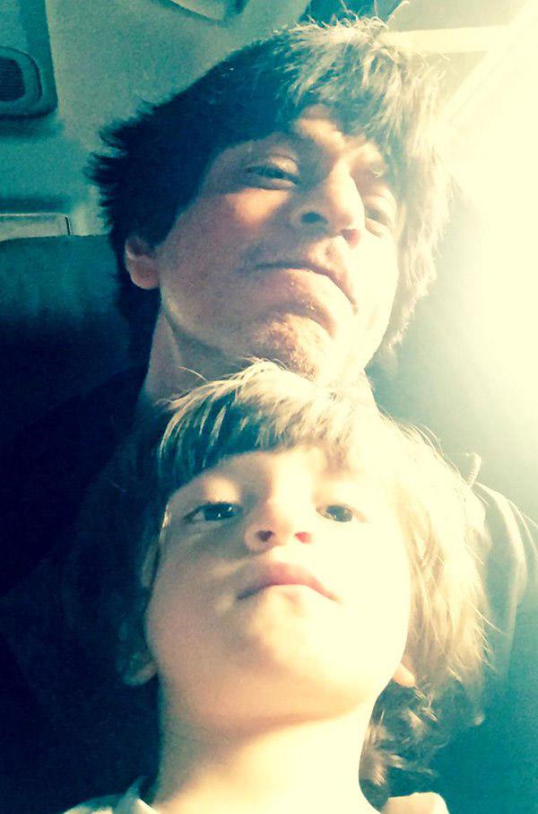 Shah Rukh Khan shared this picture, with a caption, 'You never really understand your personality, unless you have a Mini-Me who acts the same way'. And we totally agree with it!
