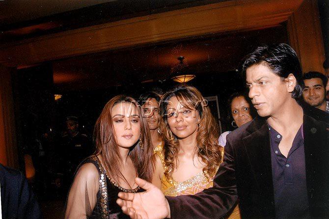 Shah Rukh Khan and wife Gauri Khan with Preity Zinta at an event